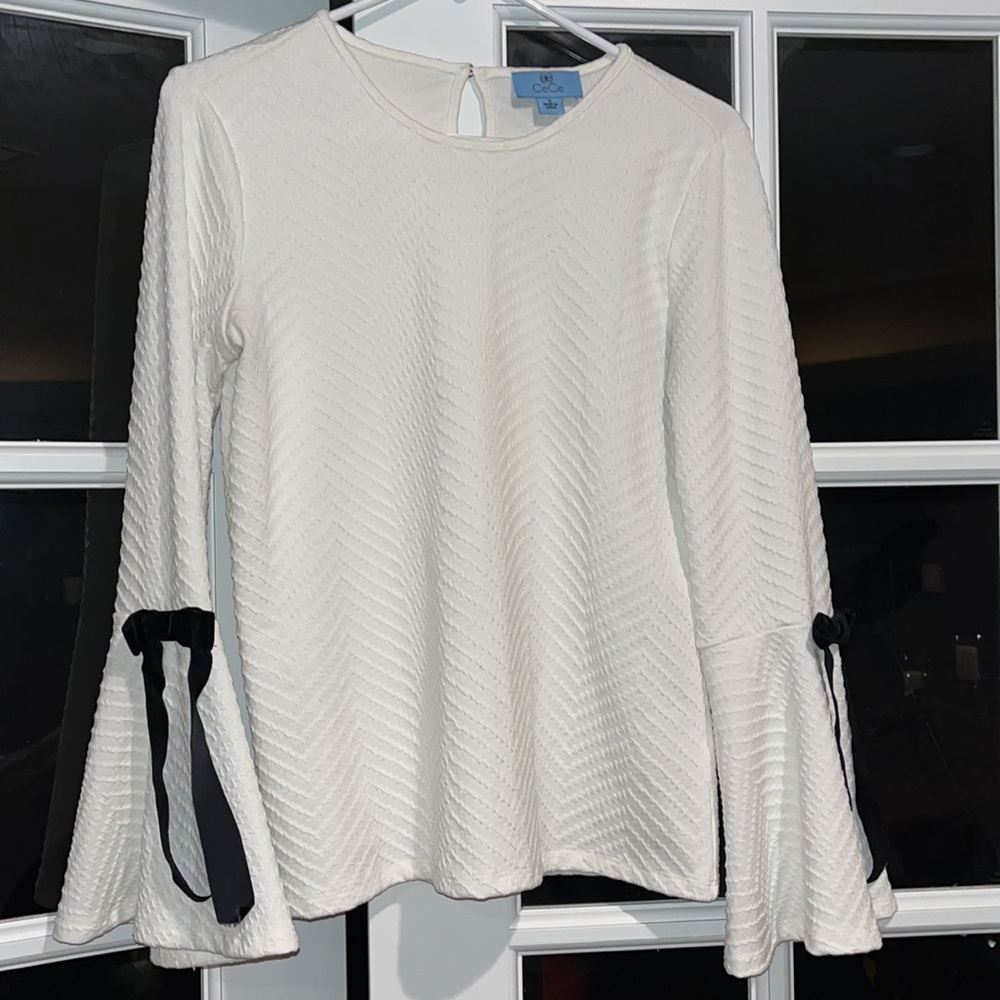 White Textured Flowy Flare Long Sleeve with Black Bow